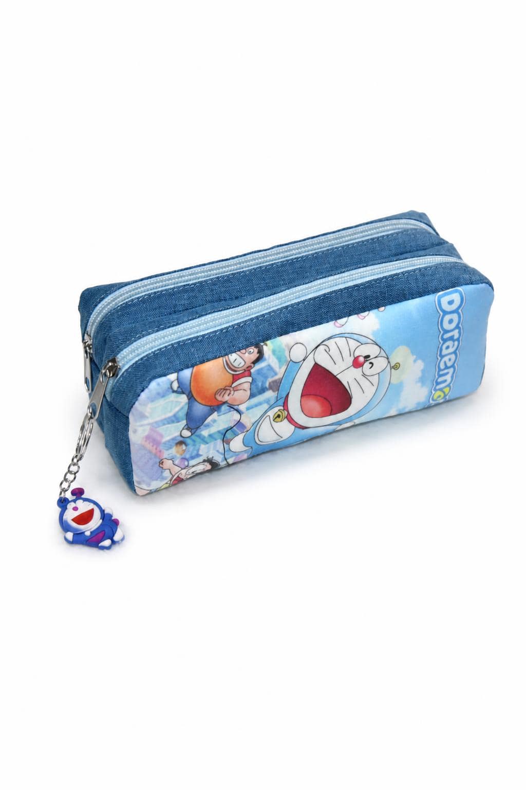 7764aac6-5add-4bfe-aae0-c1506802db60-1.jpg مقلمة Doraemon مدرسية بسحابين وشكلة - موديل 9607071 - الصورة 1